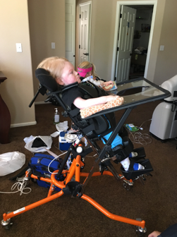 Child placed in a stander