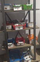 Shelf with activity bins