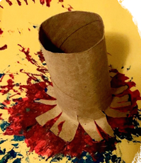 Modified paint brush using a toilet paper roll