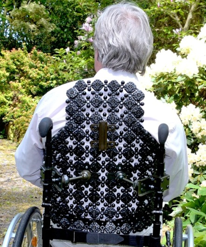 An aggressively contoured back on a wheelchair